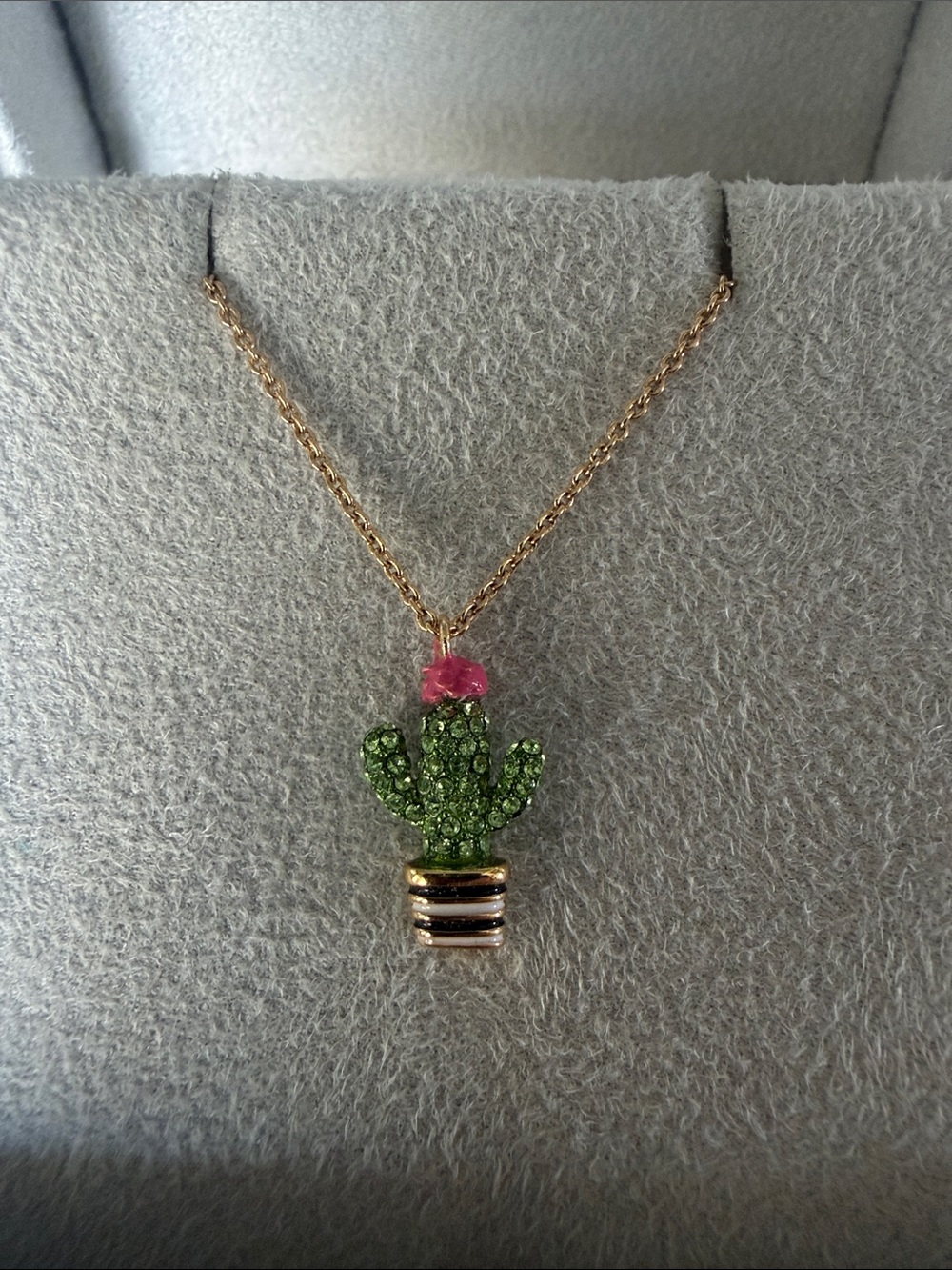 kate spade gold-tone necklace with green crystal cactus and pink flower